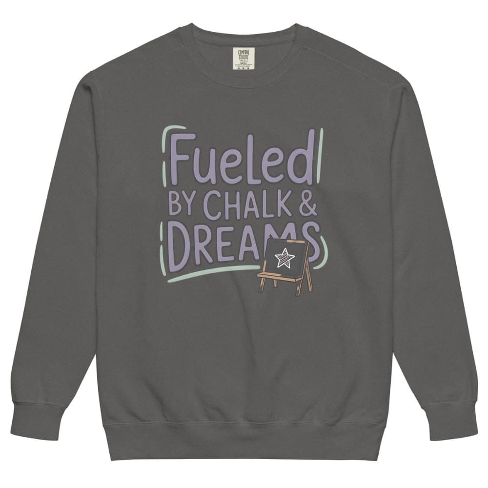 Fueled by Chalk & Dreams printed design on a vintage-style garment-dyed sweatshirt with chalkboard illustration – soft fleece ideal for teachers