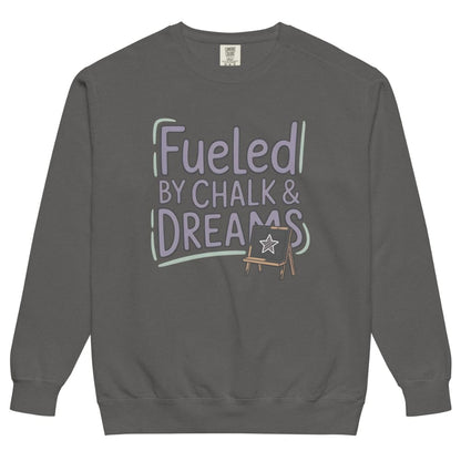 Fueled by Chalk & Dreams printed design on a vintage-style garment-dyed sweatshirt with chalkboard illustration – soft fleece ideal for teachers