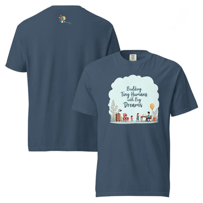 Illustrated t-shirt design with the quote "Building Tiny Humans with Big Dreams" surrounded by a family parenting scene