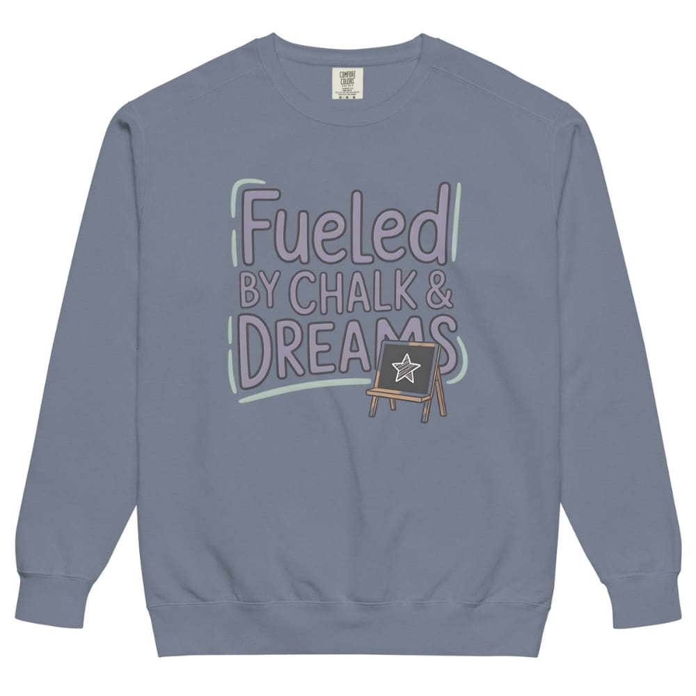 Fueled by Chalk & Dreams printed design on a vintage-style garment-dyed sweatshirt with chalkboard illustration – soft fleece ideal for teachers