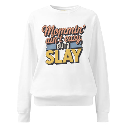 “Mommin' Ain’t Easy But I Slay” retro-style DTG printed design in peach, blue, and yellow on vintage garment-dyed fleece sweatshirt