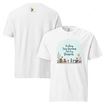 Illustrated t-shirt design with the quote "Building Tiny Humans with Big Dreams" surrounded by a family parenting scene