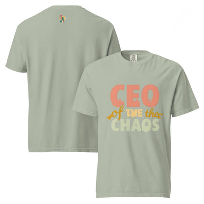 CEO of the Chaos” printed on a heavyweight cotton t-shirt in soft pastel ink, laid flat with a minimal lifestyle background.
