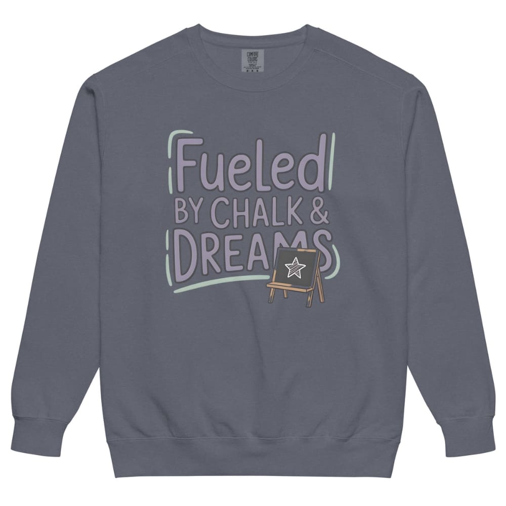 Fueled by Chalk & Dreams printed design on a vintage-style garment-dyed sweatshirt with chalkboard illustration – soft fleece ideal for teachers