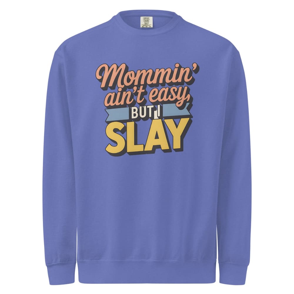 “Mommin' Ain’t Easy But I Slay” retro-style DTG printed design in peach, blue, and yellow on vintage garment-dyed fleece sweatshirt