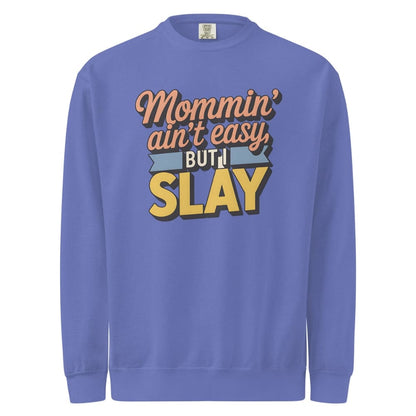 “Mommin' Ain’t Easy But I Slay” retro-style DTG printed design in peach, blue, and yellow on vintage garment-dyed fleece sweatshirt