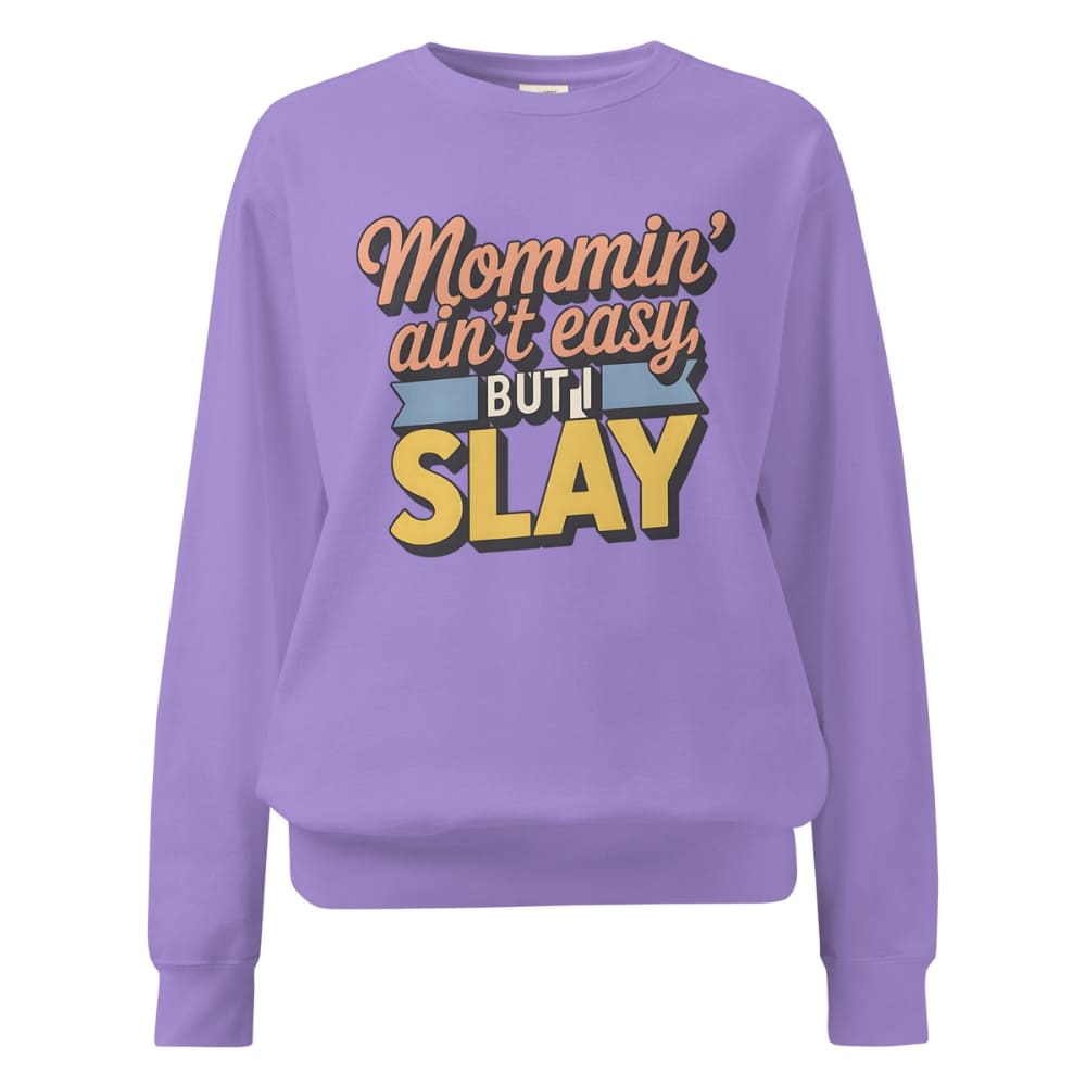 “Mommin' Ain’t Easy But I Slay” retro-style DTG printed design in peach, blue, and yellow on vintage garment-dyed fleece sweatshirt