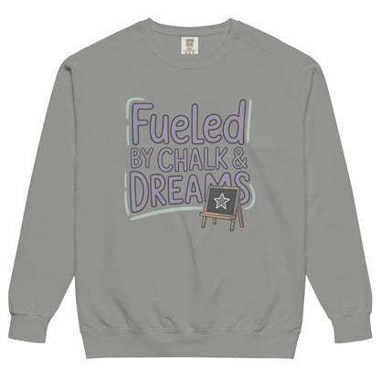 Fueled by Chalk & Dreams printed design on a vintage-style garment-dyed sweatshirt with chalkboard illustration – soft fleece ideal for teachers