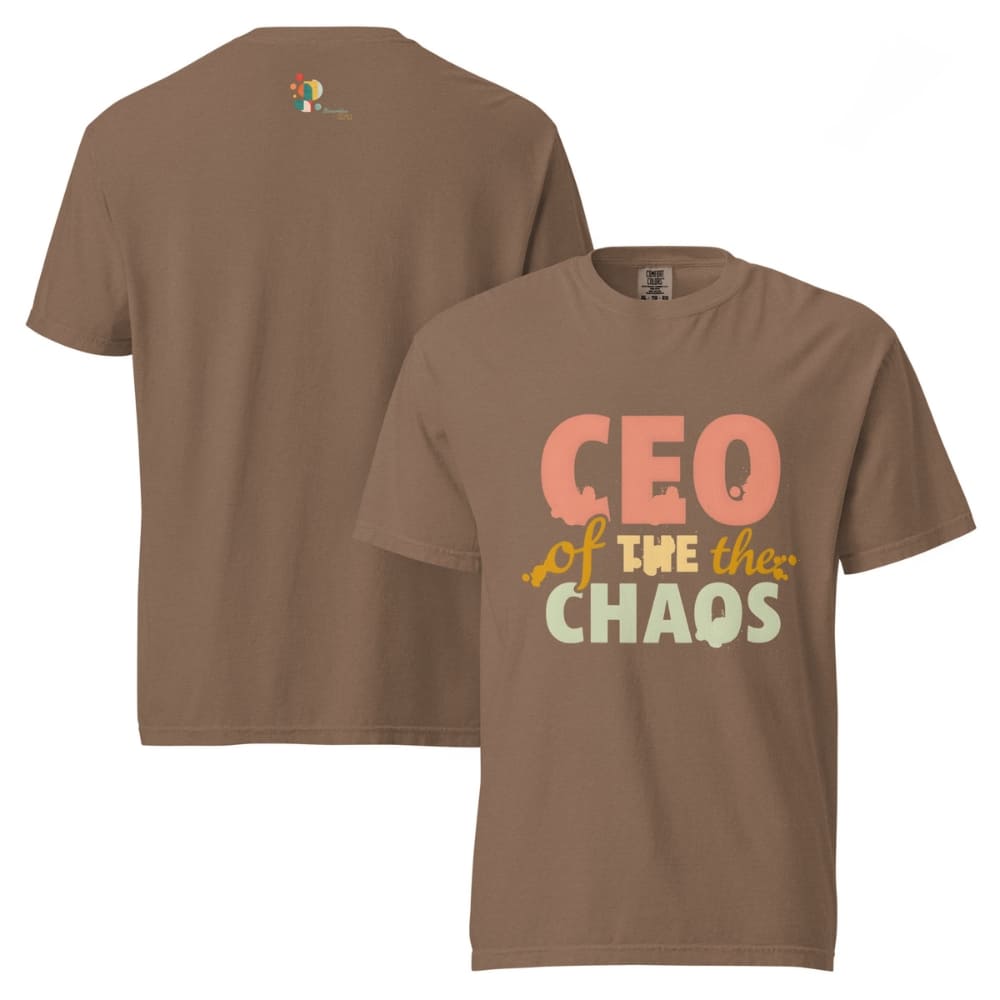 CEO of the Chaos” printed on a heavyweight cotton t-shirt in soft pastel ink, laid flat with a minimal lifestyle background.
