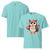 Cute cartoon owl cheerleader holding a pom-pom and clipboard, wearing a red cap with the quote “Behind Every Great Swing Is a Loud Mom” – featured on garment-dyed heavyweight cotton tee