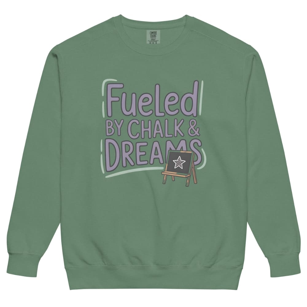 Fueled by Chalk & Dreams printed design on a vintage-style garment-dyed sweatshirt with chalkboard illustration – soft fleece ideal for teachers