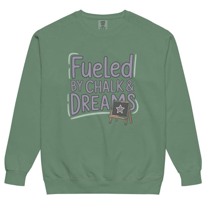 Fueled by Chalk & Dreams printed design on a vintage-style garment-dyed sweatshirt with chalkboard illustration – soft fleece ideal for teachers