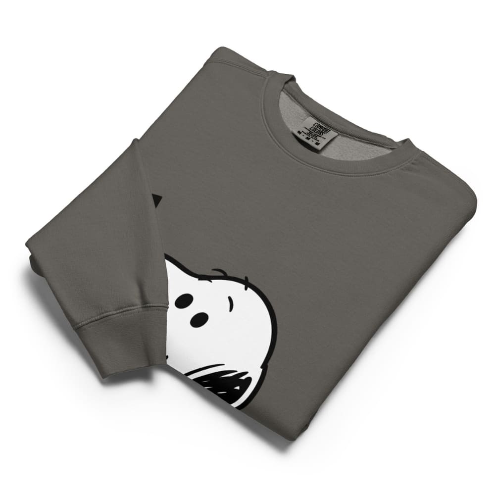 Folded gray sweatshirt with a cartoon ghost design on a white background