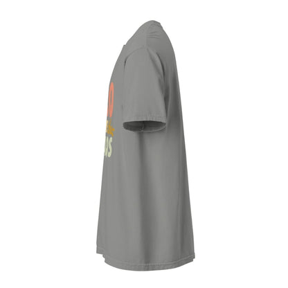 CEO of the Chaos” printed on a heavyweight cotton t-shirt in soft pastel ink, laid flat with a minimal lifestyle background.