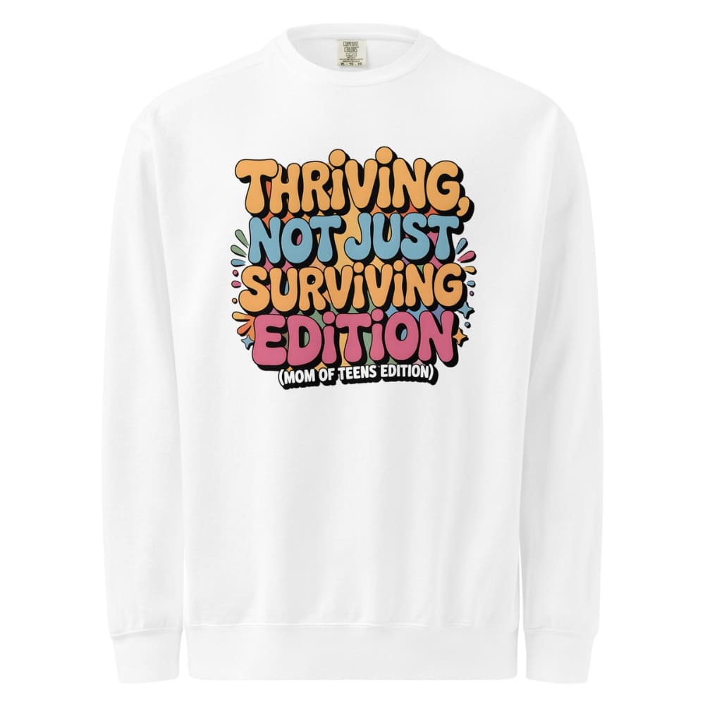 White long-sleeve shirt with colorful text design on a white background