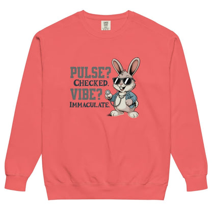 Coral sweatshirt with a cartoon rabbit and text on a white background