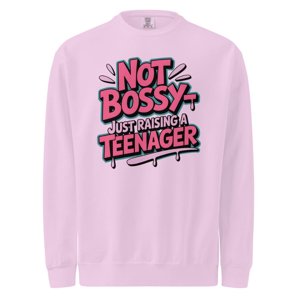 Pink sweatshirt with 'Not Bossy Just Raising a Teenager' text on a white background