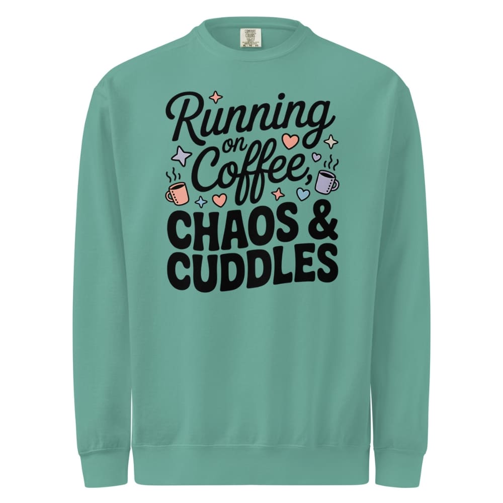 Teal sweatshirt with text 'Running on Coffee, Chaos & Cuddles' on a white background