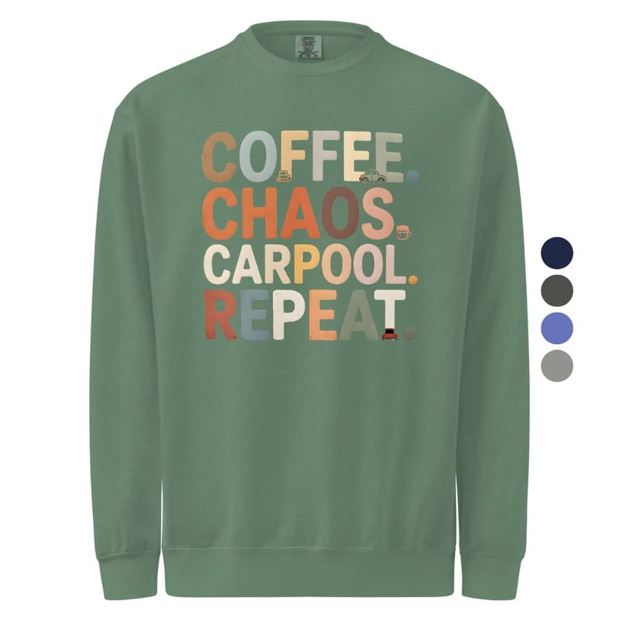 Green sweatshirt with colorful text 'COFFEE. CHAOS. CARPOOL. REPEAT.' on a white background.