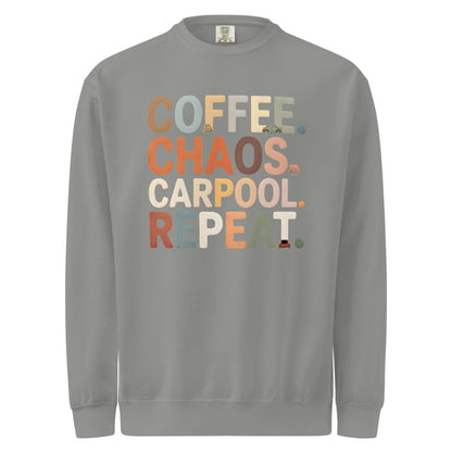Gray sweatshirt with colorful text 'COFFEE. CHAOS. CARPOOL. REPEAT.' on a white background