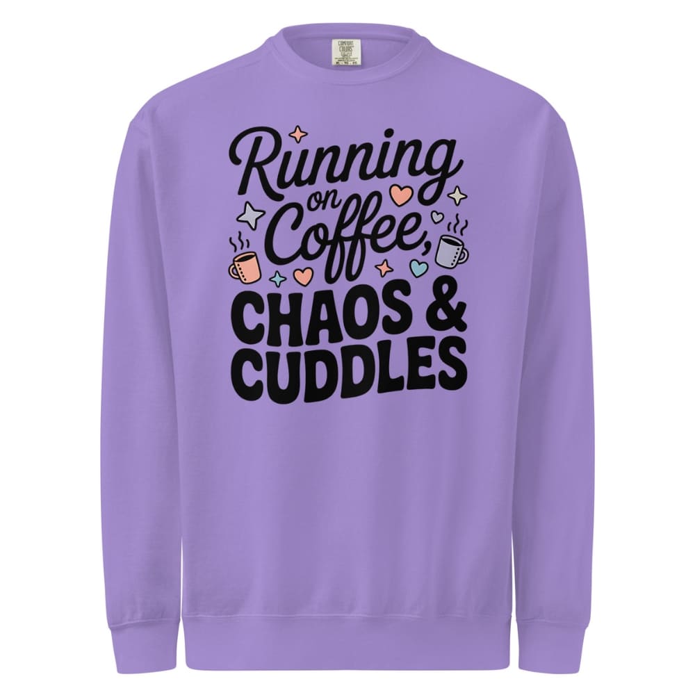 Purple sweatshirt with text 'Running on Coffee, Chaos & Cuddles' on a white background