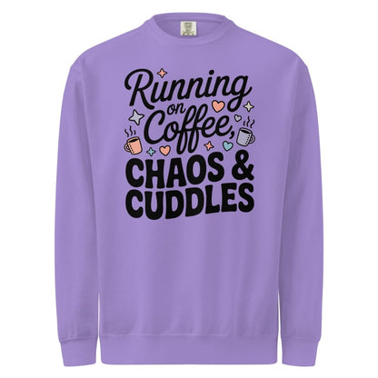 Purple sweatshirt with text 'Running on Coffee, Chaos & Cuddles' on a white background
