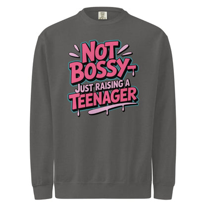 Gray sweatshirt with colorful text 'Not Bossy Just Raising a Teenager' on a white background