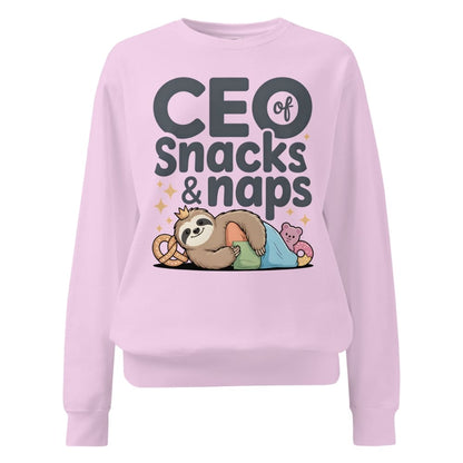 "CEO of Snacks & Naps" printed sweatshirt featuring a sloth in a crown surrounded by pretzels and plushies on vintage-washed cotton fleece