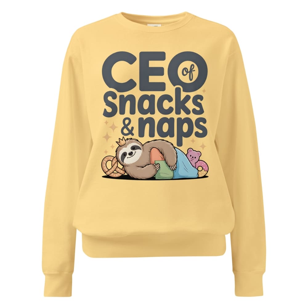 "CEO of Snacks & Naps" printed sweatshirt featuring a sloth in a crown surrounded by pretzels and plushies on vintage-washed cotton fleece