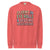Red sweatshirt with colorful text 'FLUENT IN EYE ROLLS & BEDTIME NEGOTIATIONS' on a white background
