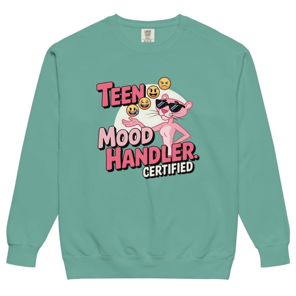 Teal sweatshirt with a graphic design featuring a character and text on a white background
