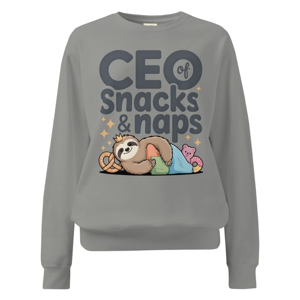 "CEO of Snacks & Naps" printed sweatshirt featuring a sloth in a crown surrounded by pretzels and plushies on vintage-washed cotton fleece