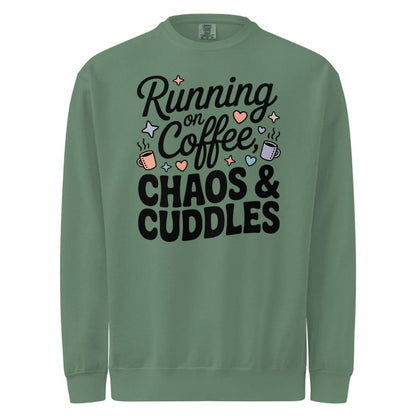 Green sweatshirt with text 'Running on Coffee, Chaos & Cuddles' on a white background
