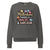 Sweatshirt design with text “Motherhood. Powered by Snacks & Sarcasm.” featuring colorful macarons and a steaming coffee cup on vintage-washed cotton fleece.