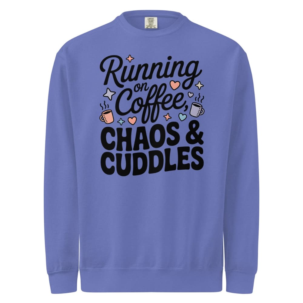 Blue sweatshirt with text 'Running on Coffee, Chaos & Cuddles' on a white background