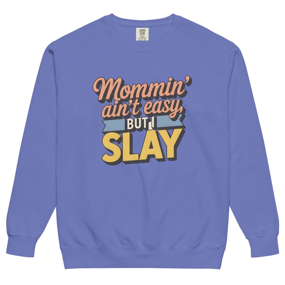 “Mommin' Ain’t Easy But I Slay” retro-style DTG printed design in peach, blue, and yellow on vintage garment-dyed fleece sweatshirt