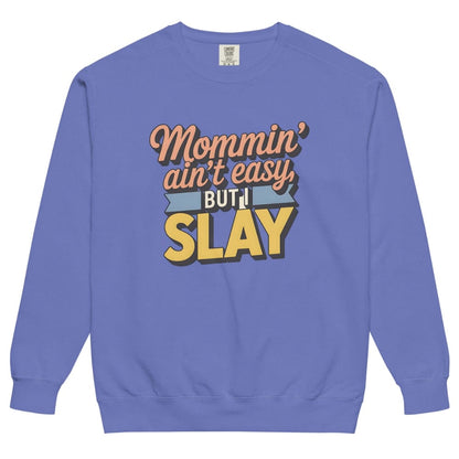 “Mommin' Ain’t Easy But I Slay” retro-style DTG printed design in peach, blue, and yellow on vintage garment-dyed fleece sweatshirt