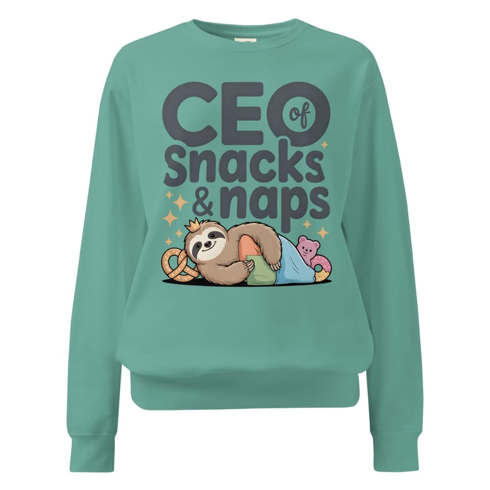 "CEO of Snacks & Naps" printed sweatshirt featuring a sloth in a crown surrounded by pretzels and plushies on vintage-washed cotton fleece