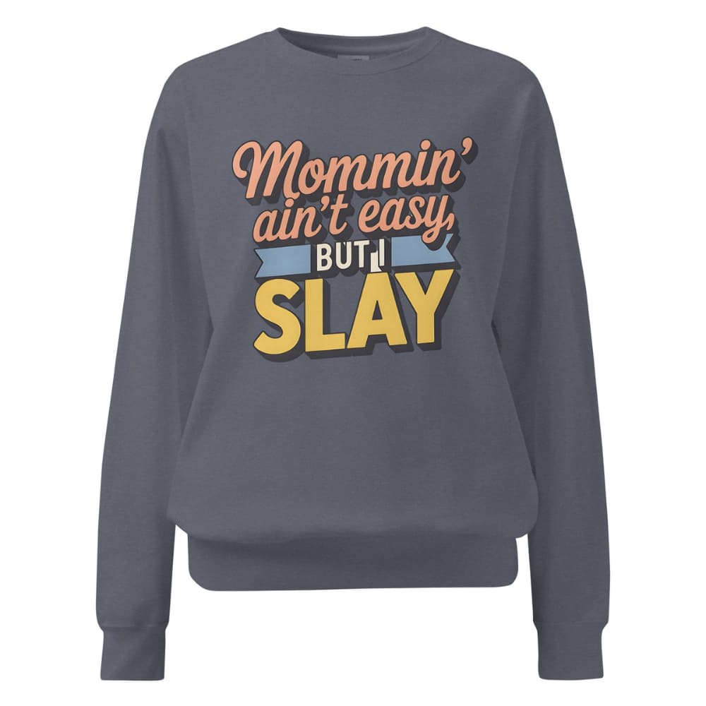 “Mommin' Ain’t Easy But I Slay” retro-style DTG printed design in peach, blue, and yellow on vintage garment-dyed fleece sweatshirt