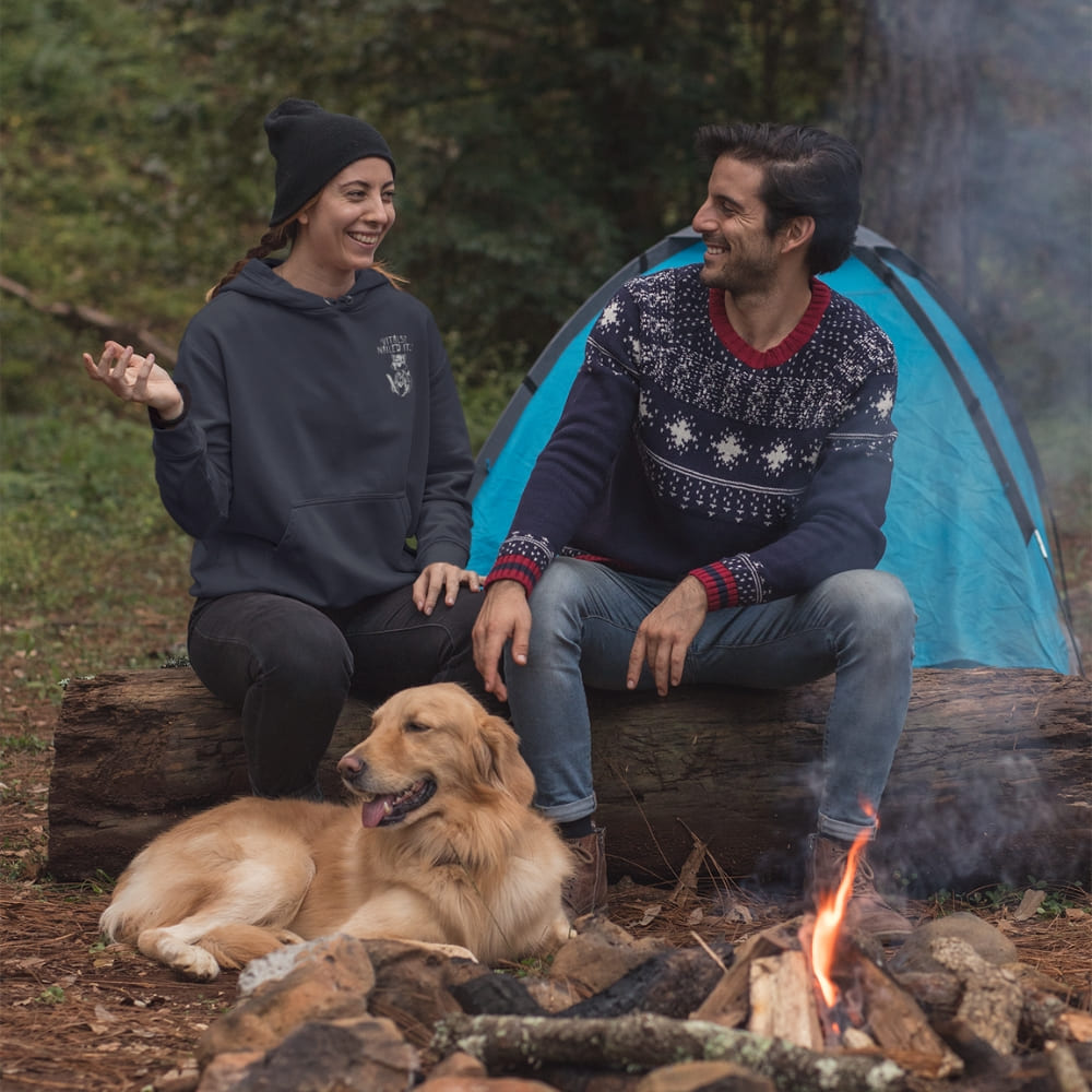 Raccoon nurse graphic wearing scrubs and sunglasses holding a clipboard under the quote “Vitals? Nailed It.” – printed on a black Cotton Heritage hoodie