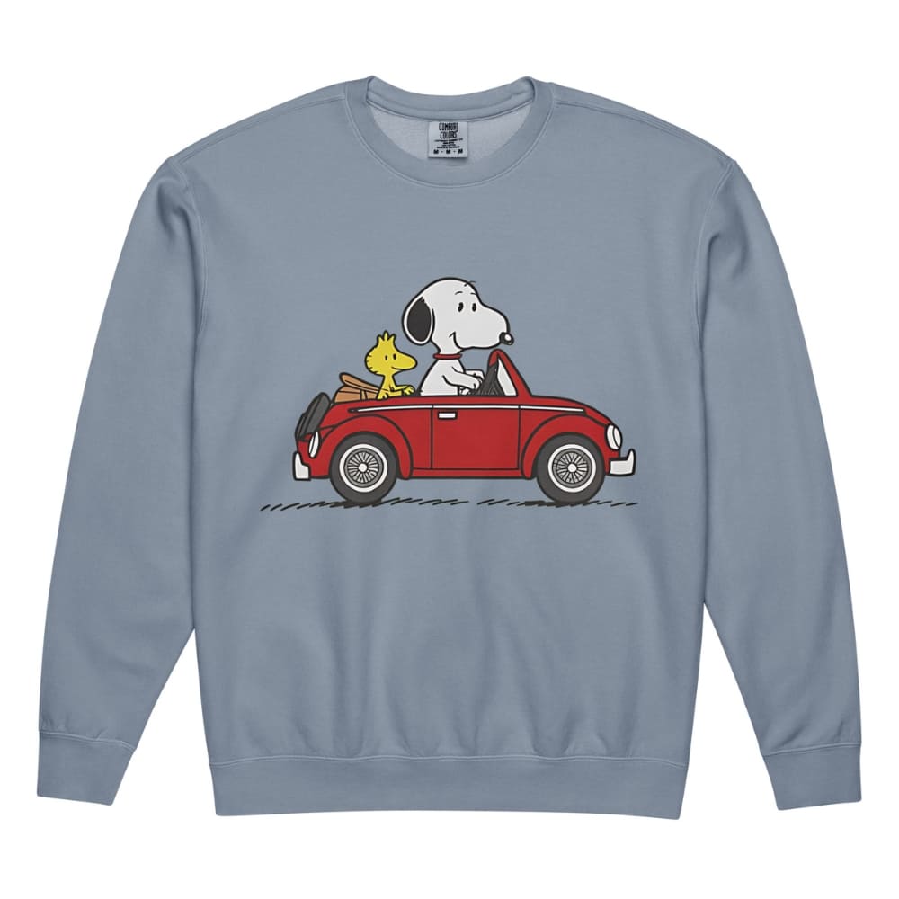 Blue sweatshirt with a graphic of Snoopy and Woodstock in a red car on a white background