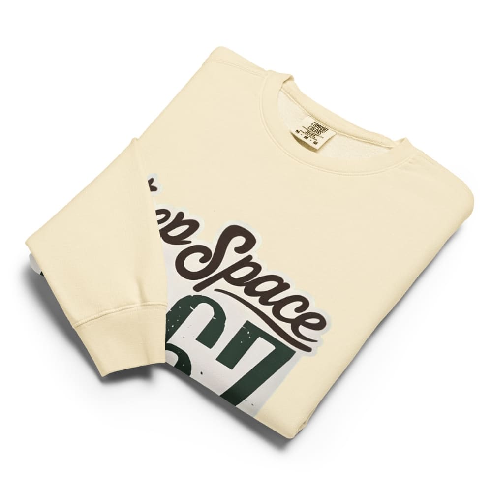 Beige sweatshirt with 'Keep Space' graphic design on a white background
