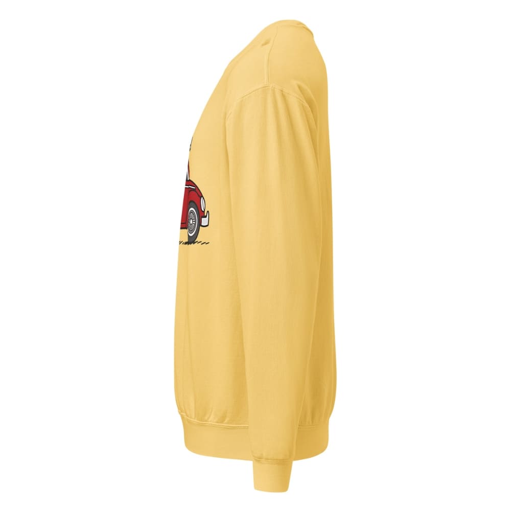 Yellow sweatshirt with a red car graphic on the sleeve against a white background