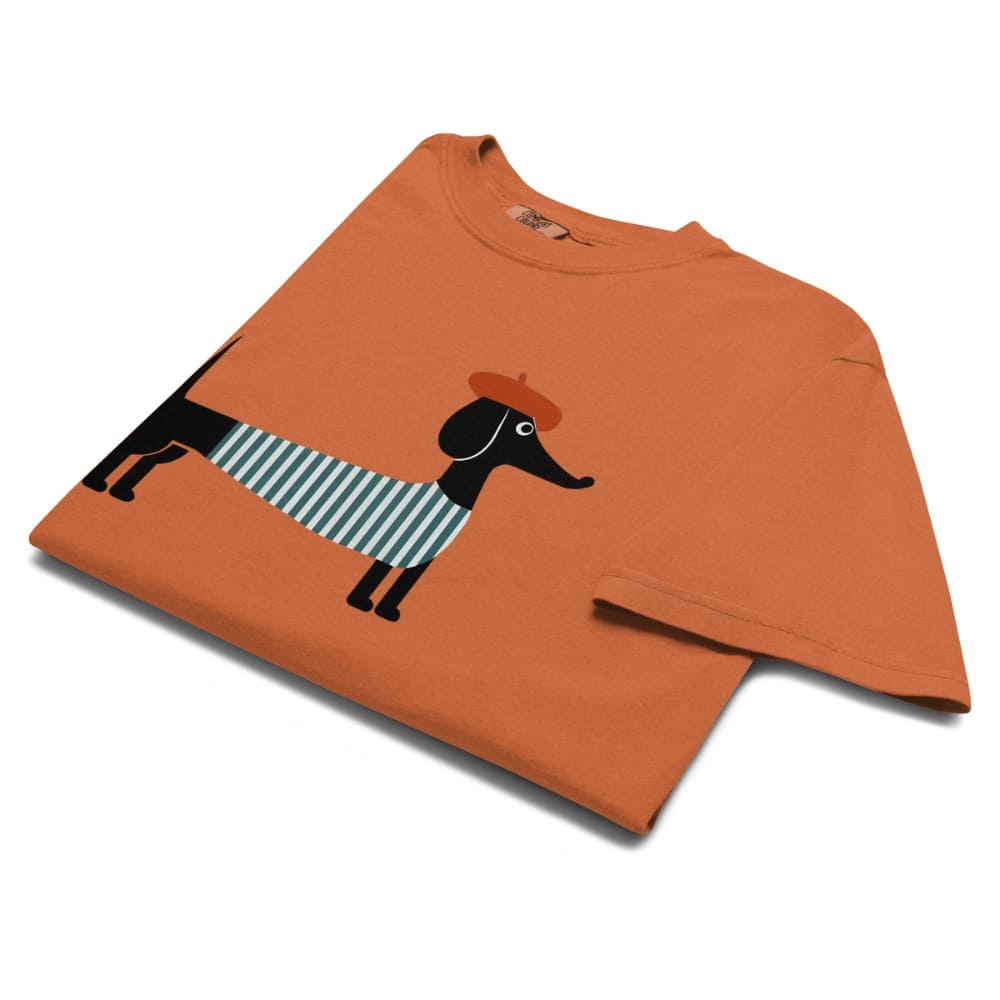 Yam orange t-shirt with a black dog wearing a striped sweater design on a white background