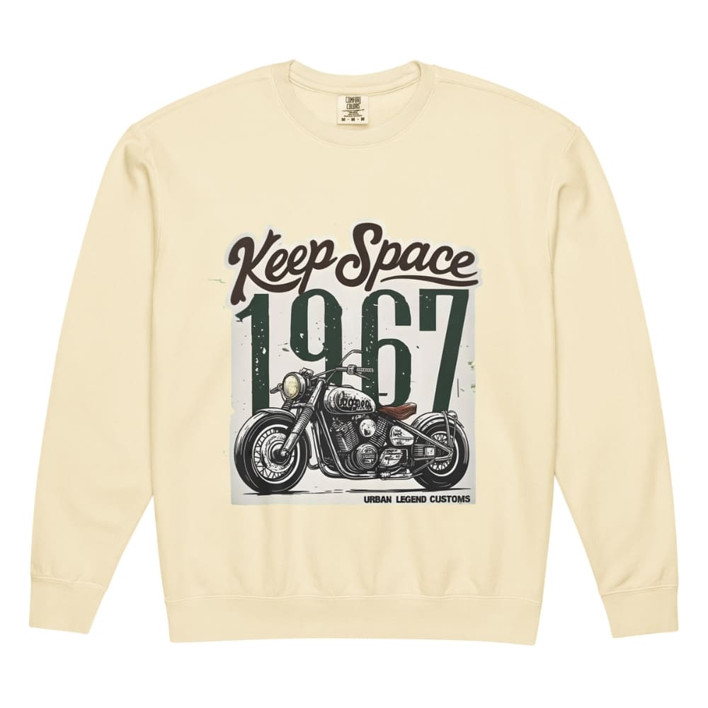 Beige sweatshirt with motorcycle graphic and text 'Keep Space 1967' on a white background