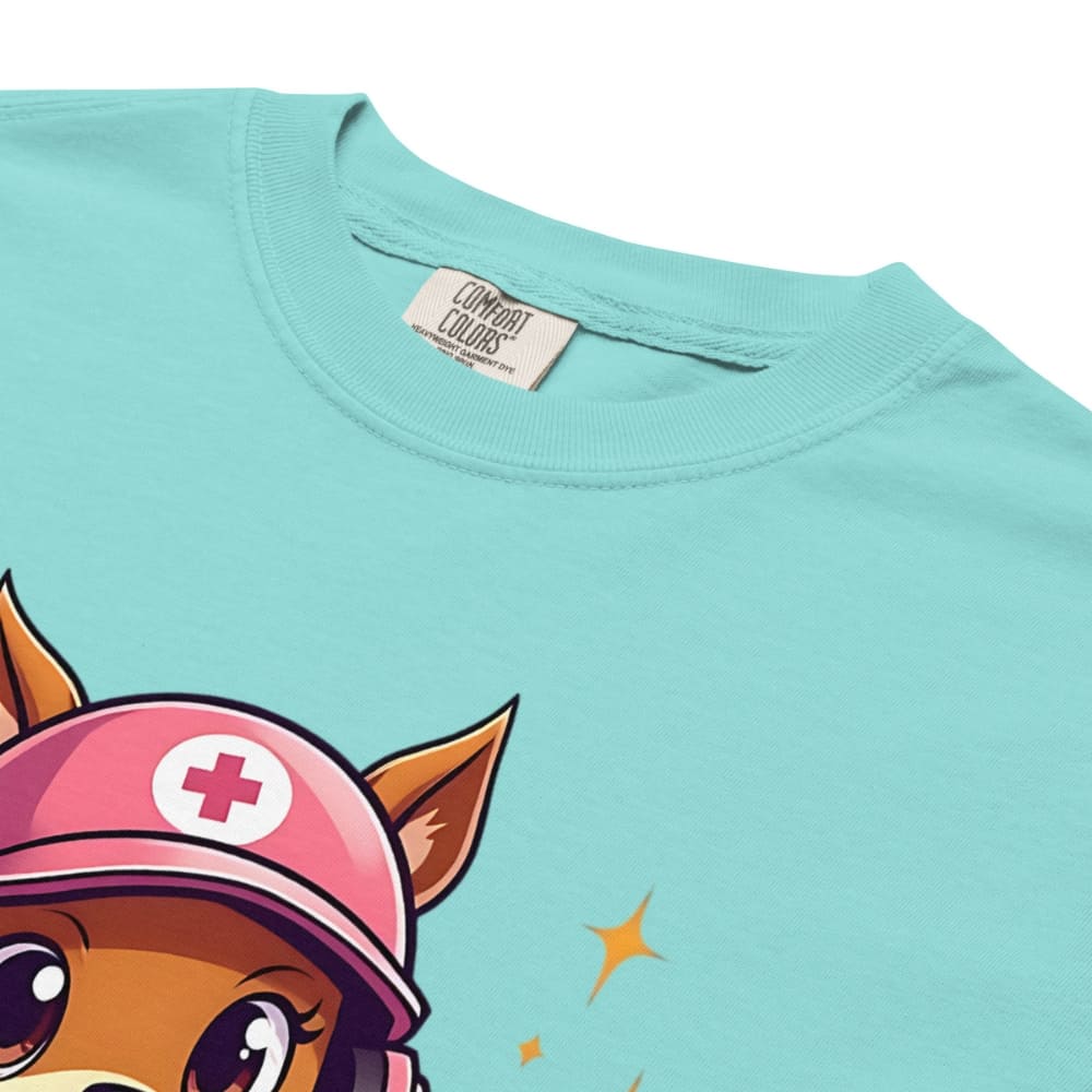 Cute squirrel nurse cartoon in scrubs, pink cap, and headset holding a softball and medical kit with the phrase “Saving Lives Between Innings” — printed on a heavyweight cotton t-shirt