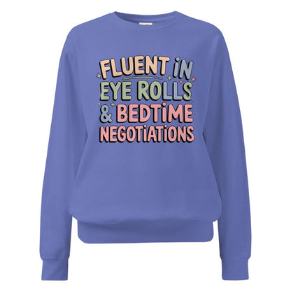 Blue sweatshirt with colorful text on a white background