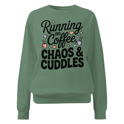 Green sweatshirt with text 'Running on Coffee, Chaos & Cuddles' on a white background
