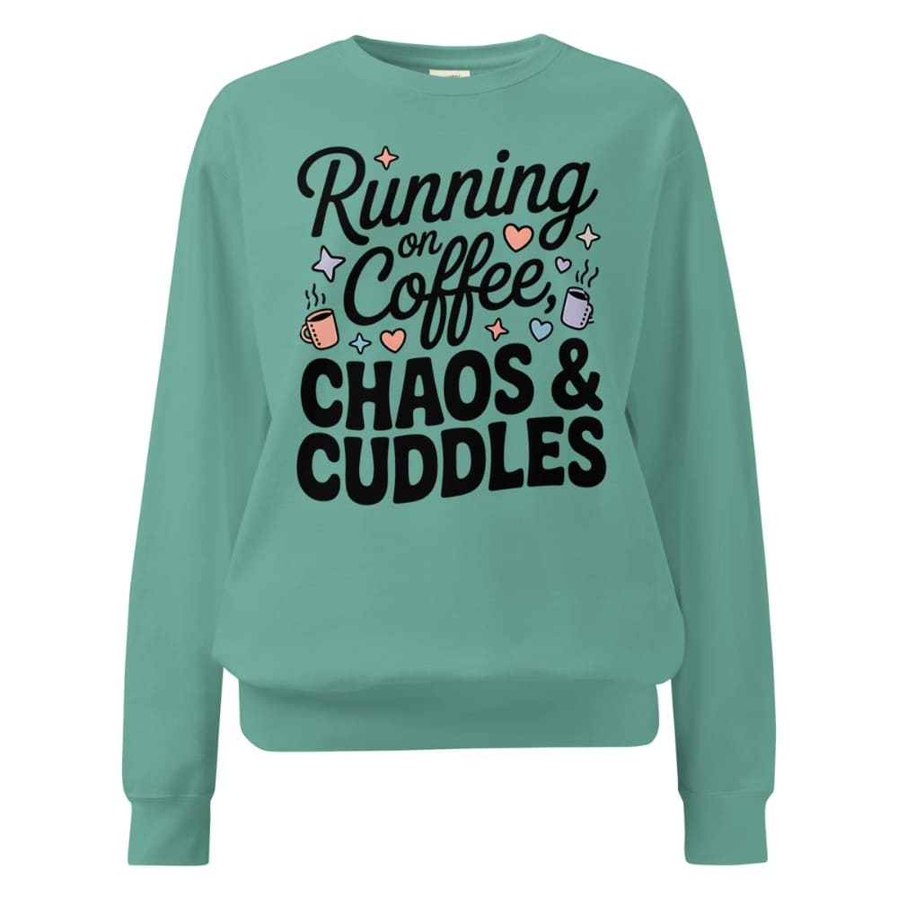 Teal sweatshirt with text 'Running on Coffee, Chaos & Cuddles' on a white background