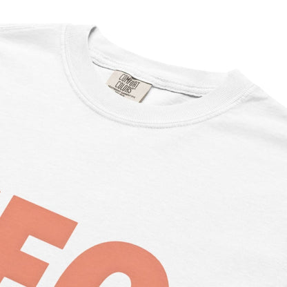 CEO of the Chaos” printed on a heavyweight cotton t-shirt in soft pastel ink, laid flat with a minimal lifestyle background.